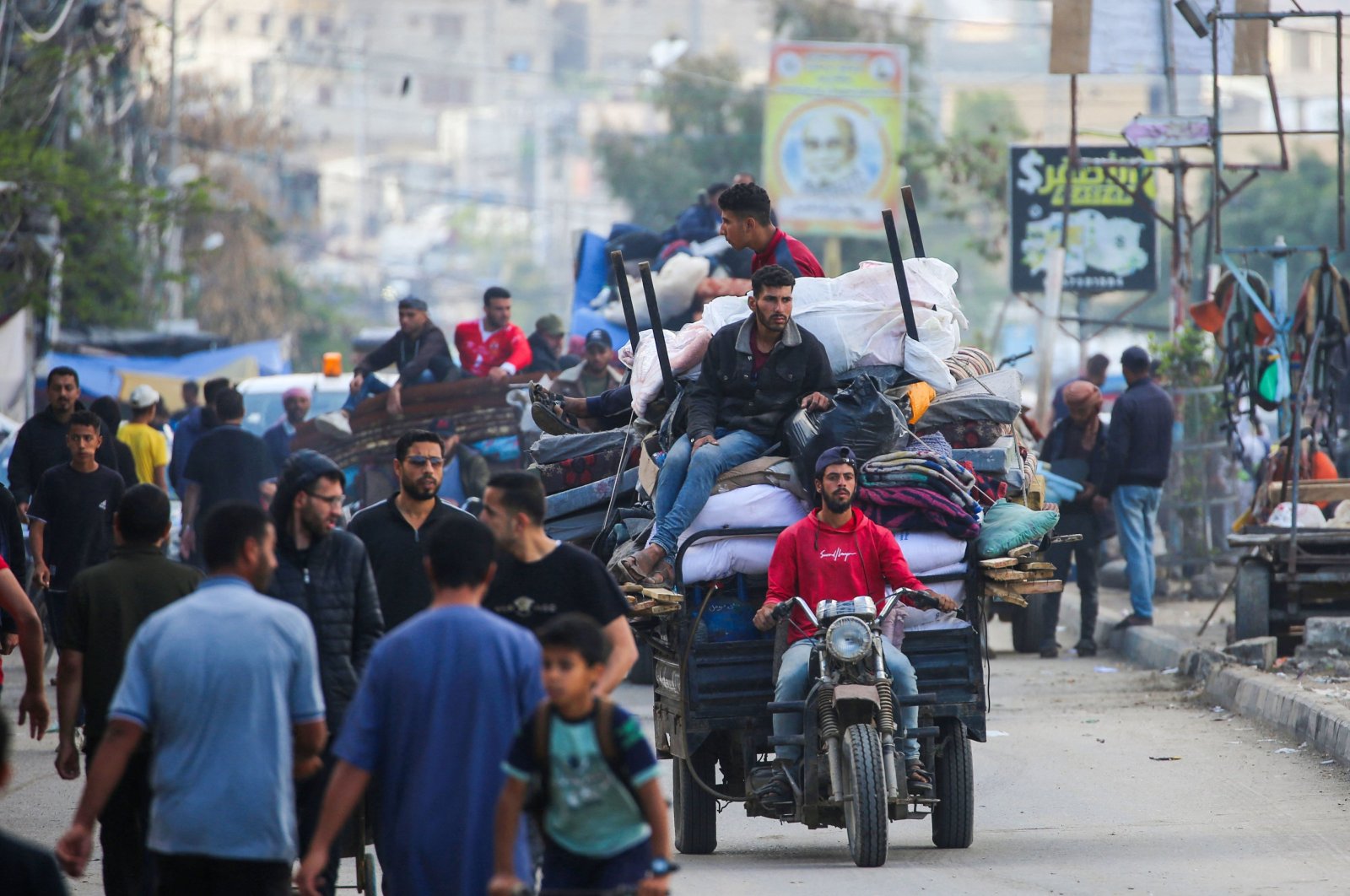 Displaced Palestinians flee Rafah with their belongings to safer areas in the southern Gaza Strip following an evacuation order by the Israeli army the previous day, Palestine, May 7, 2024. (AFP Photo)