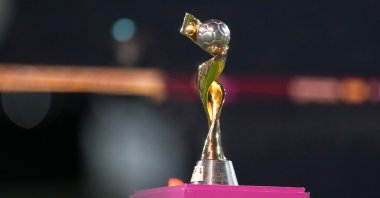 The tournament trophy is displayed on the pitch before the Women&#039;s World Cup final between Spain and England, Stadium Australia, Sydney, Australia, Aug. 20, 2023. (AP Photo)