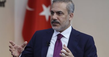 Foreign Minister Hakan Fidan gestures during an interview with Al-Arabiya at the Foreign Ministry, Ankara, Türkiye, May 5, 2024. (AA Photo)