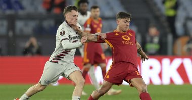 Roma's Paulo Dybala (R) drives the ball during the UEFA Europa League semifinal first leg match between AS Roma and Bayer 04 Leverkusen at the Olympic stadium, Rome, Italy, May 2, 2024. (AP Photo)