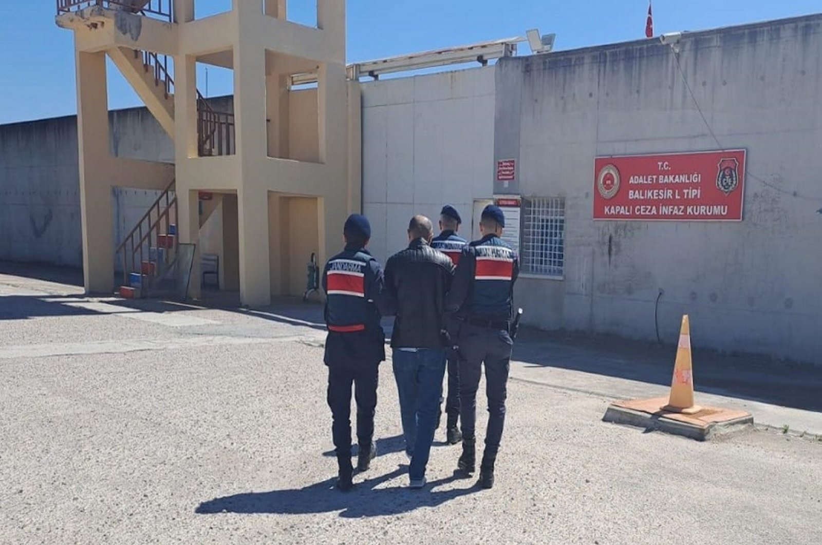 Gendarmerie officers escort a captured FETÖ member to prison, Balıkesir, western Türkiye, May 6, 2024. (AA Photo)