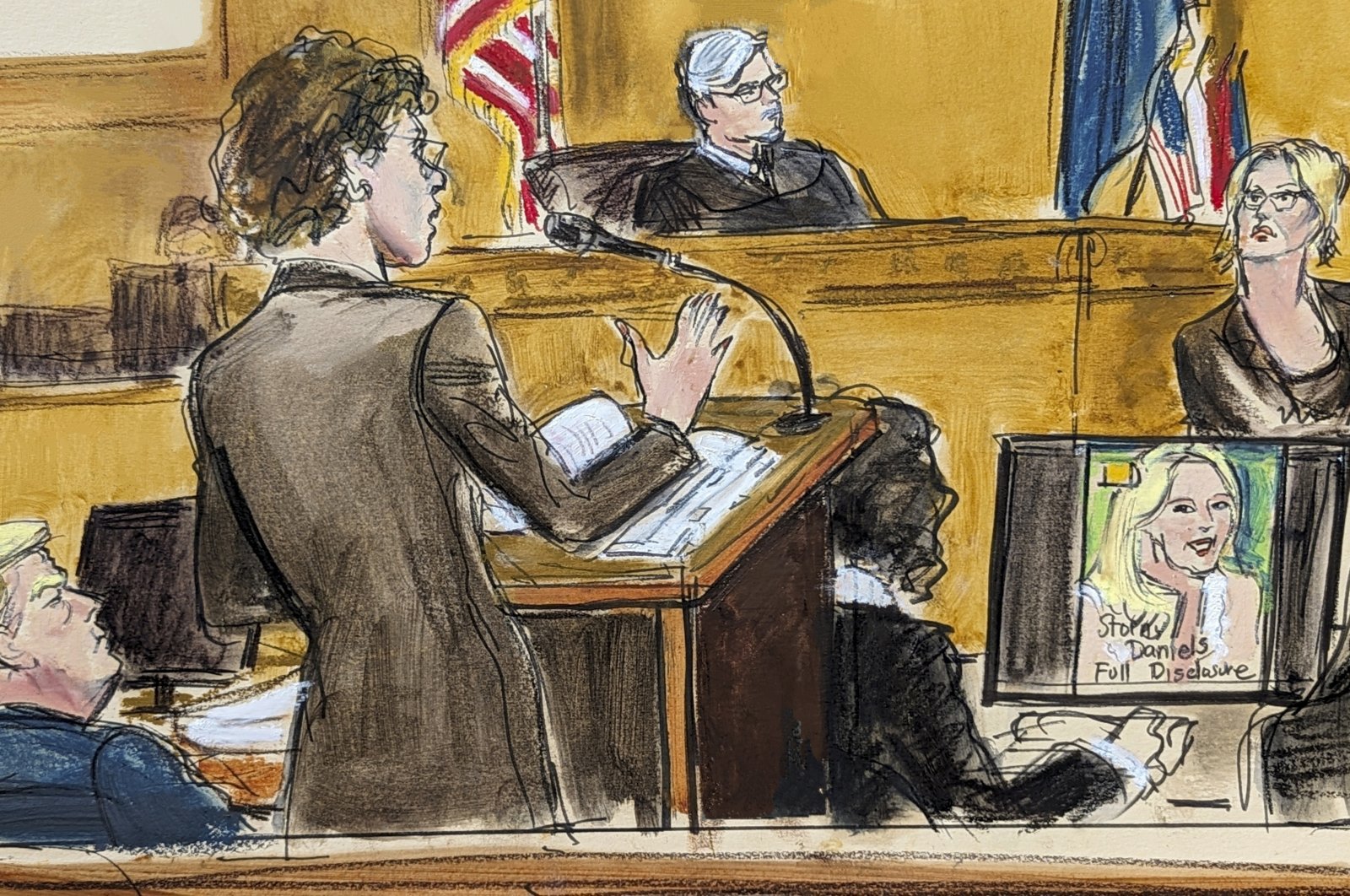In this courtroom sketch, defense attorney Susan Necheles (C) cross-examines Stormy Daniels, (R), whose real name is Stephanie Clifford, as former President Donald Trump, (L), looks on with Judge Juan Merchan presiding during Trump&#039;s trial in Manhattan criminal court, New York, U.S., May 7, 2024, in New York. (AP Photo)