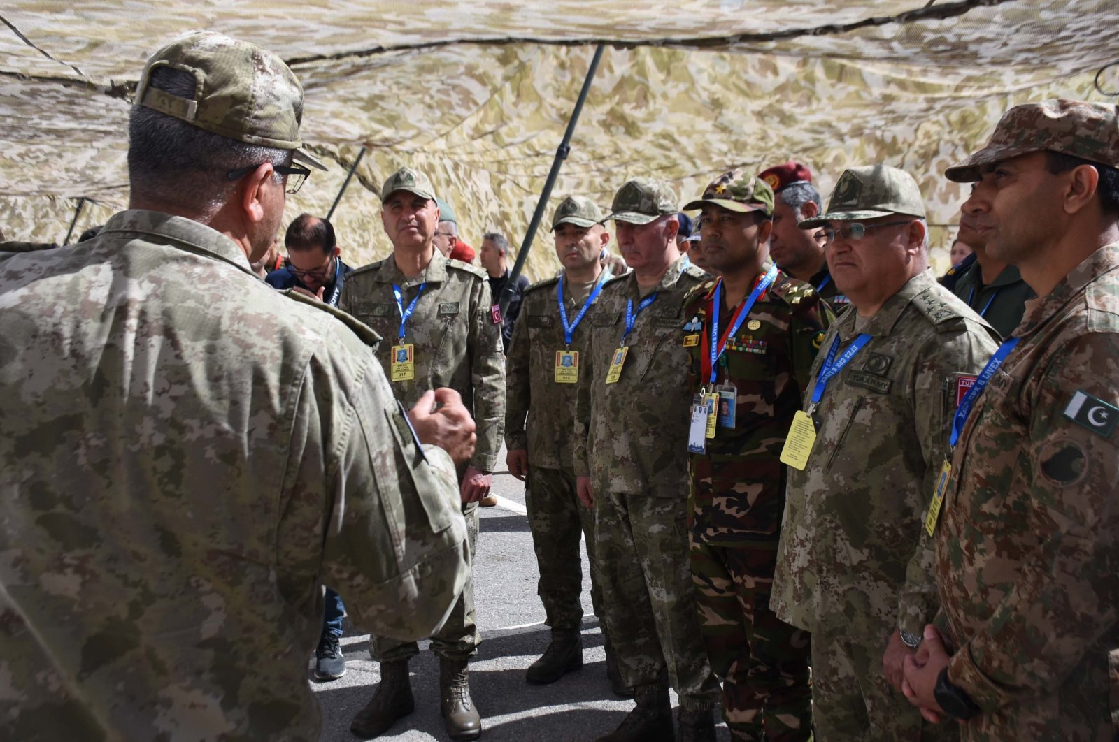 Turkish naval officers hold a briefing with foreign soldiers as they conclude the Computer-Assisted Command Post Exercise in western Izmir province, Türkiye, May 8, 2024. (AA Photo)