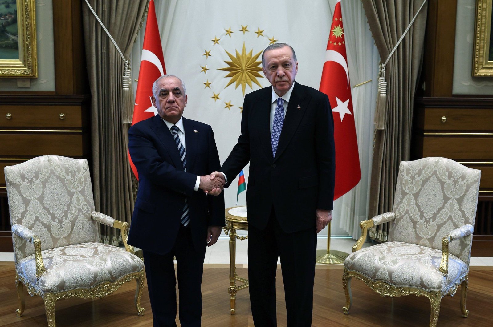 President Recep Tayyip Erdoğan shakes hands with Ali Asadov, May 9, 2024. (DHA Photo)