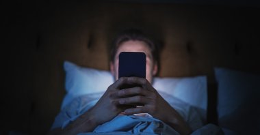 Minimize tempting notifications by putting the phone on do not disturb, which can be adjusted to allow calls and messages from certain people. (Shutterstock Photo)