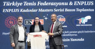 Enplus CEO Murat Hatipoğlu (L), Turkish national tennis player Ayla Aksu (C) and Turkish Tennis Federation President Cengiz Durmuş pose for a photo during the Tennis Masters&#039; Women&#039;s Series launch, Istanbul, Türkiye, May 9, 2024. (AA Photo)