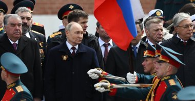 Russian President Vladimir Putin (C) and foreign leaders take part in a wreath-laying ceremony at the Tomb of the Unknown Soldier in Alexander Garden on Victory Day, in Moscow, Russia, May 9, 2024. (EPA Photo)