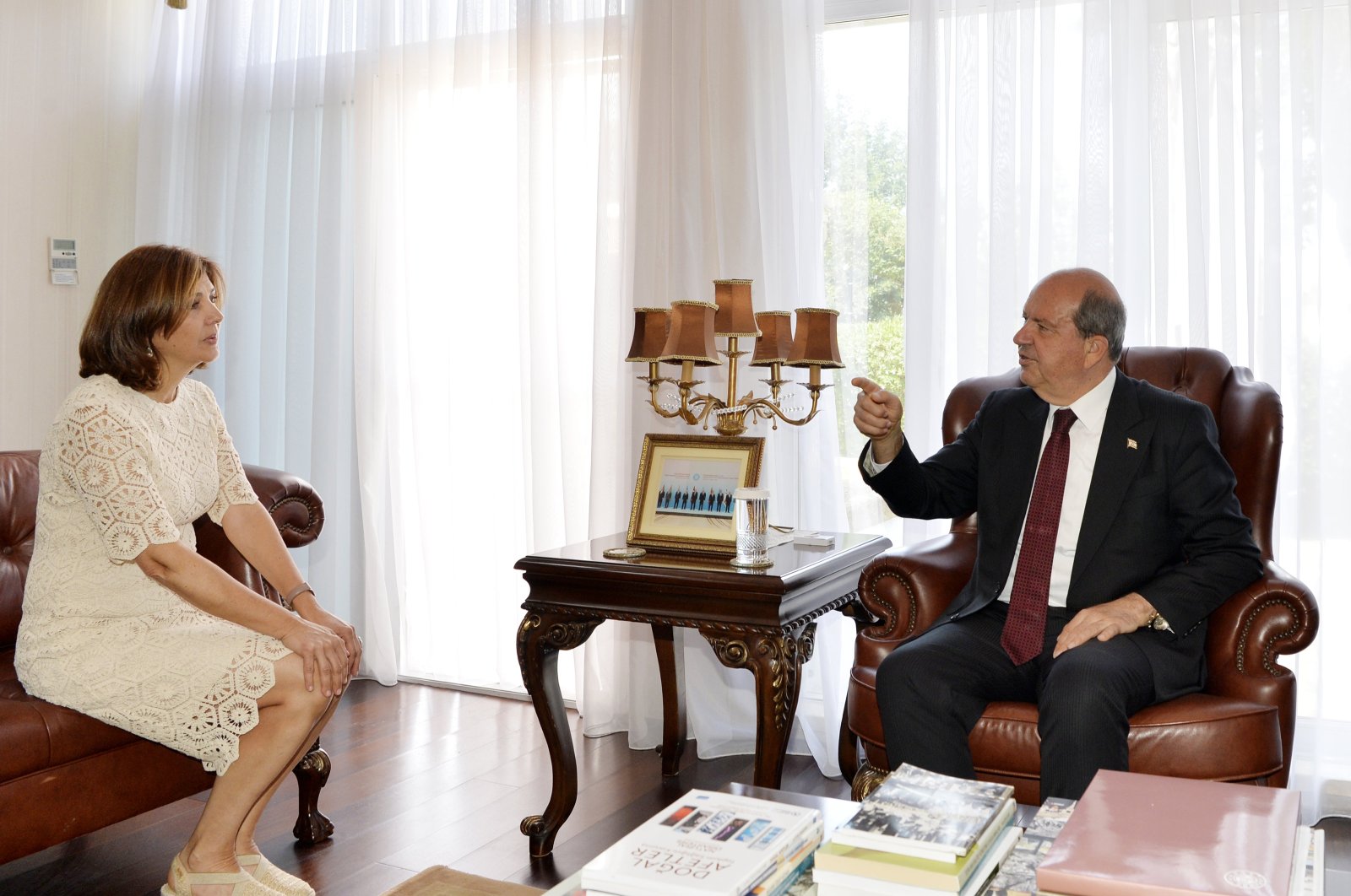 Turkish Republic of Northern Cyprus (TRNC) President Ersin Tatar hosts U.N. representative Maria Angela Holguin Cuellar at the presidential office in Lefkoşa (Nicosia), TRNC, May 8, 2024. (AA Photo)