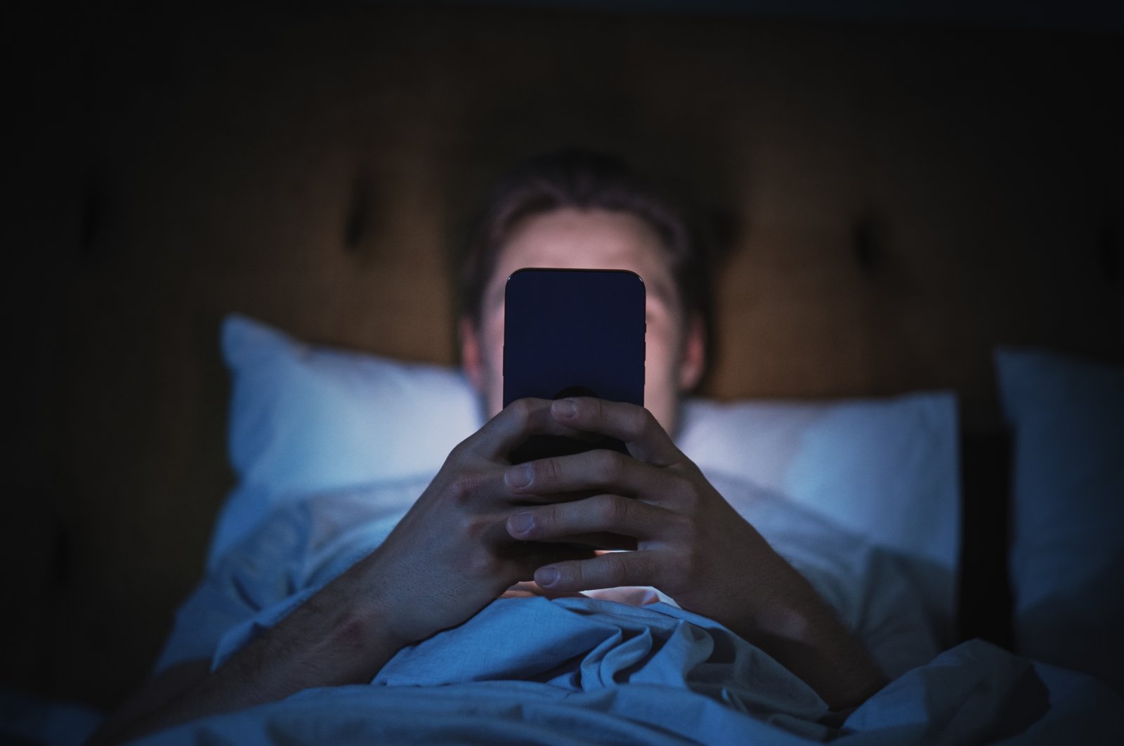 Minimize tempting notifications by putting the phone on do not disturb, which can be adjusted to allow calls and messages from certain people. (Shutterstock Photo)