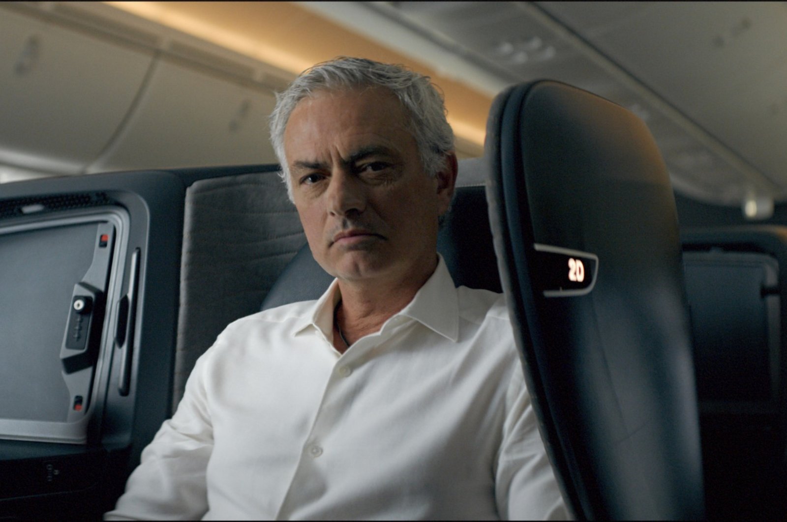 World-renowned Portuguese coach Jose Mourinho sits in an aircraft for a Turkish Airlines Champions League ad, Istanbul, Türkiye, May 9, 2024. (AA Photo)