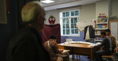 Electoral representatives count the ballots at a polling station, Istanbul, Türkiye, March 31, 2024. (AP Photo)