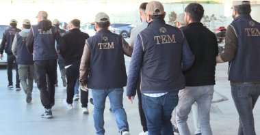 Police escort PKK suspects captured in Eskişehir, central Türkiye, May 8, 2024. (AA Photo) 
