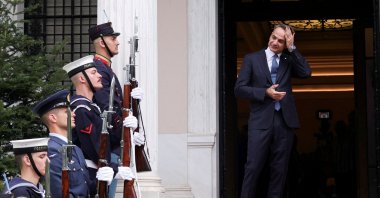 Greek Prime Minister Kyriakos Mitsotakis gestures, as he waits to welcome Turkish President Tayyip Erdoğan at Maximos Mansion, Athens, Greece, Dec. 7, 2023. (Reuters Photo)