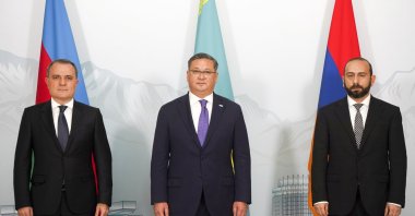 Azerbaijan's Foreign Minister Jeyhun Bayramov, left, Kazakhstan Foreign Minister Murat Nurtleu, center, and Armenian Foreign Minister Ararat Mirzoyan pose for a photo prior to their talks in Almaty, Kazakhstan, Friday, May 10, 2024. (Vladimir Tretyakov/NUR.KZ via AP)