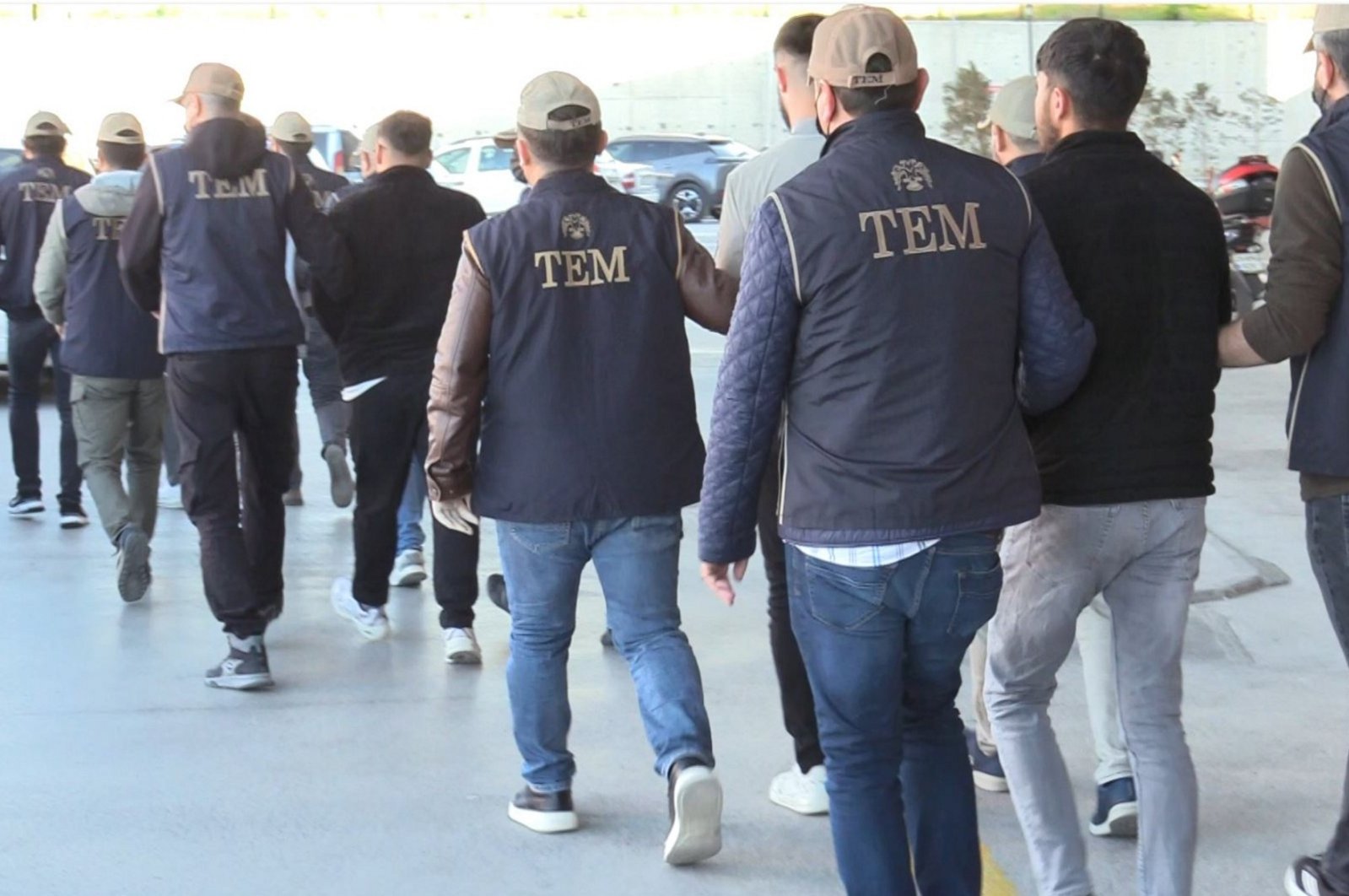 Police escort PKK suspects captured in Eskişehir, central Türkiye, May 8, 2024. (AA Photo) 