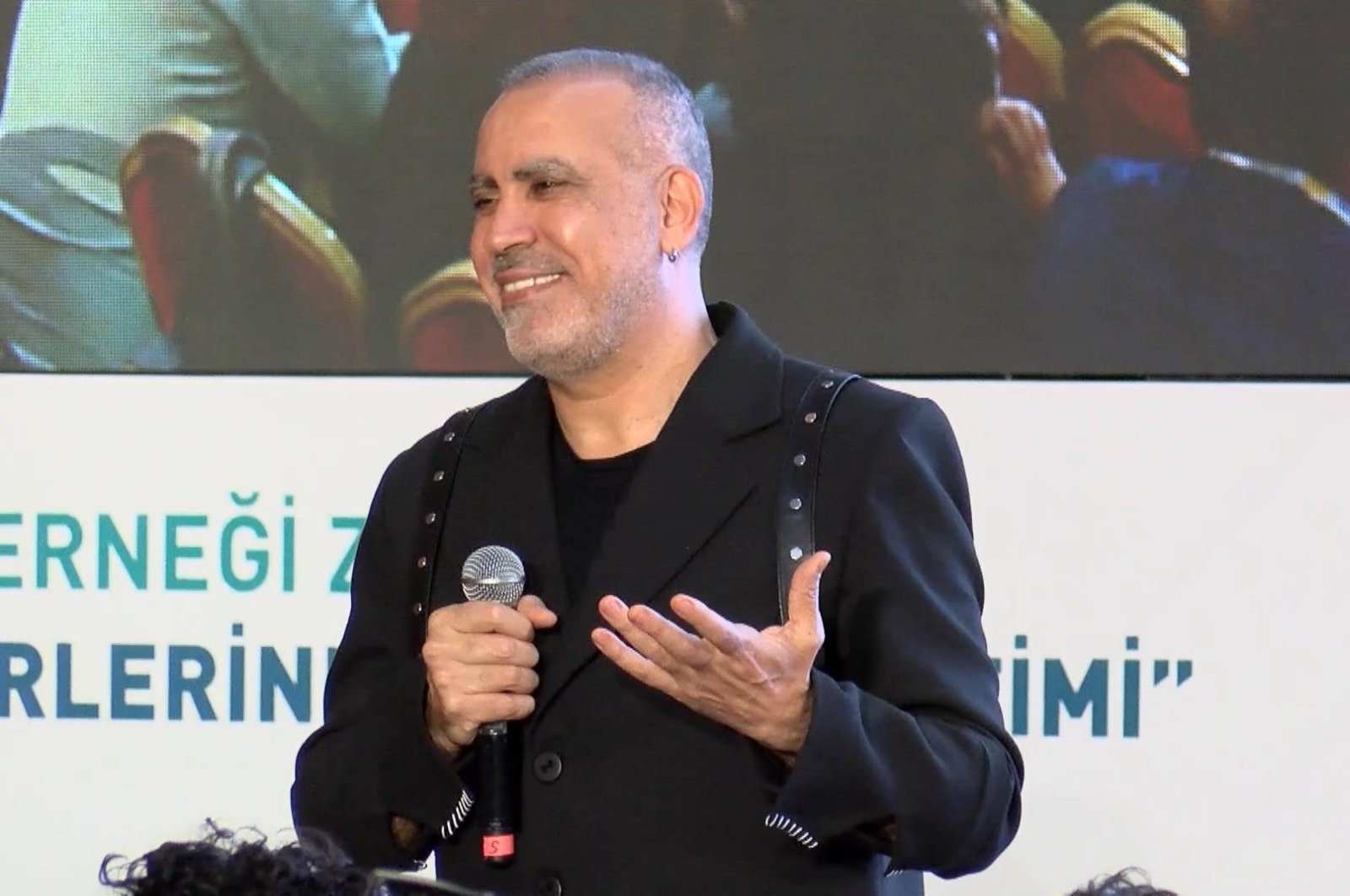Haluk Levent speaks at an event for his charity AHBAP, Istanbul, Türkiye, March 27, 2024. (DHA Photo)