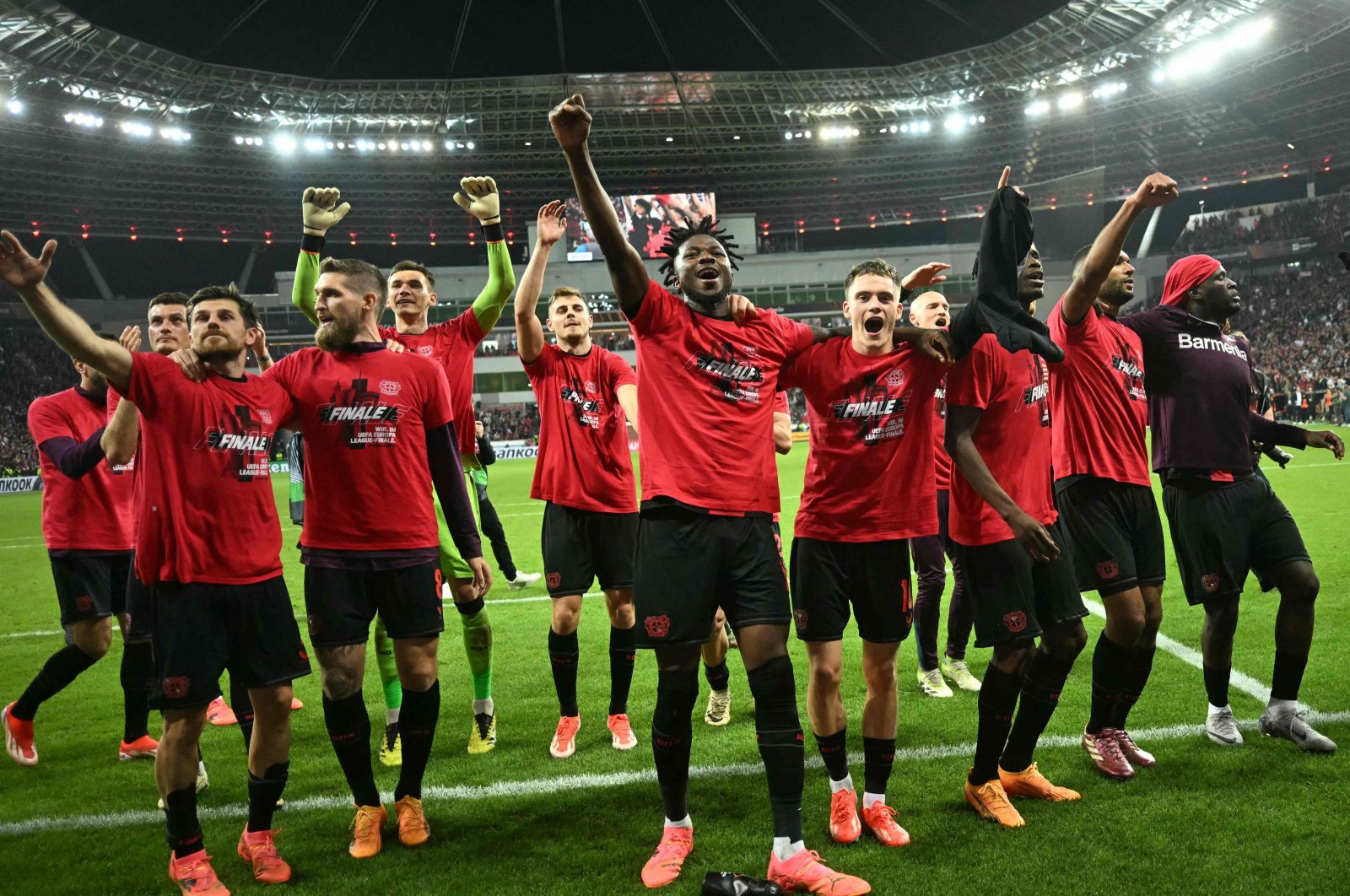 Bayer Leverkusen&#039;s players celebrate after the UEFA Europa League semi final second leg football match between Bayer Leverkusen and ASC Roma, Leverkusen, Germany, May 9, 2024. (AFP Photo)