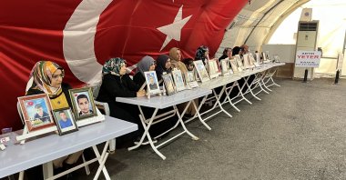 The "Diyarbakır Mothers" pose with photos of their children abducted by the PKK, Diyarbakır, southeastern Türkiye, May 12, 2024. (DHA Photo)