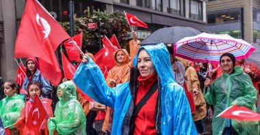 People march and wave Turkish flags during the 40th Turkish Day Parade, New York, U.S., May 20, 2023. (AA Photo)