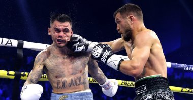 Vasiliy Lomachenko (R) in action with George Kambosos Jr. during their IBF lightweight championship fight, Perth, Australia, May 12, 2024.