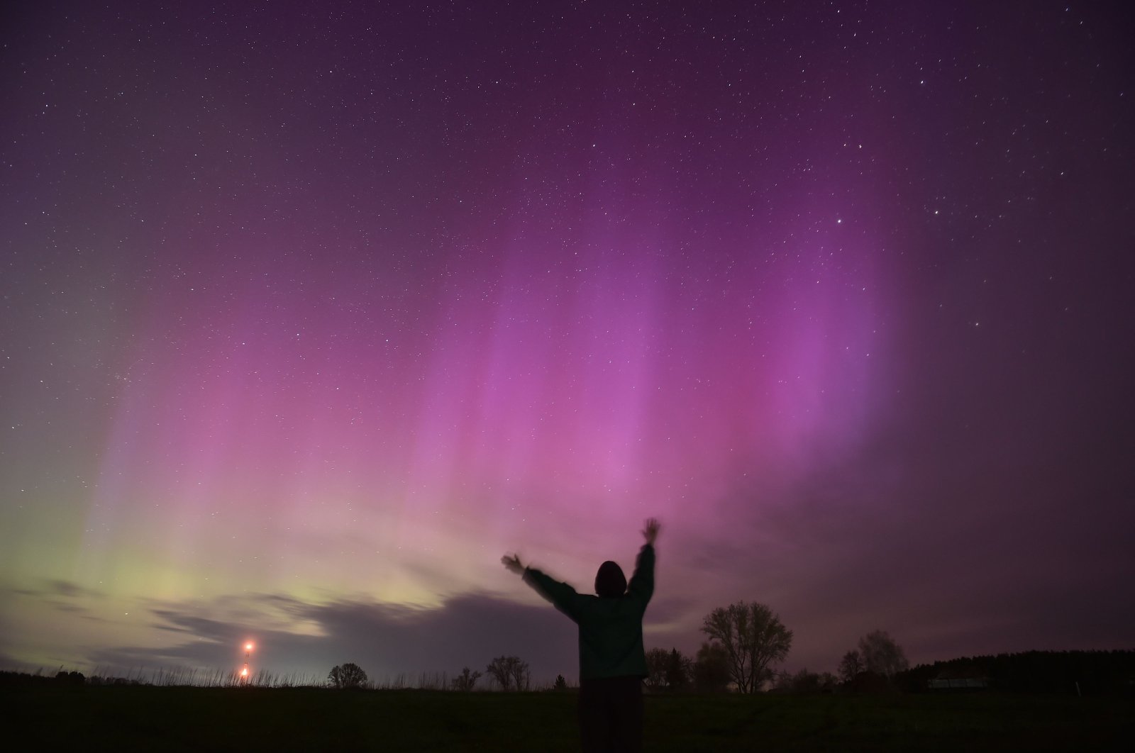 Northern lights or aurora borealis illuminate the night sky in the Novosibirsk region, Russia, May 12, 2024. (AFP Photo)