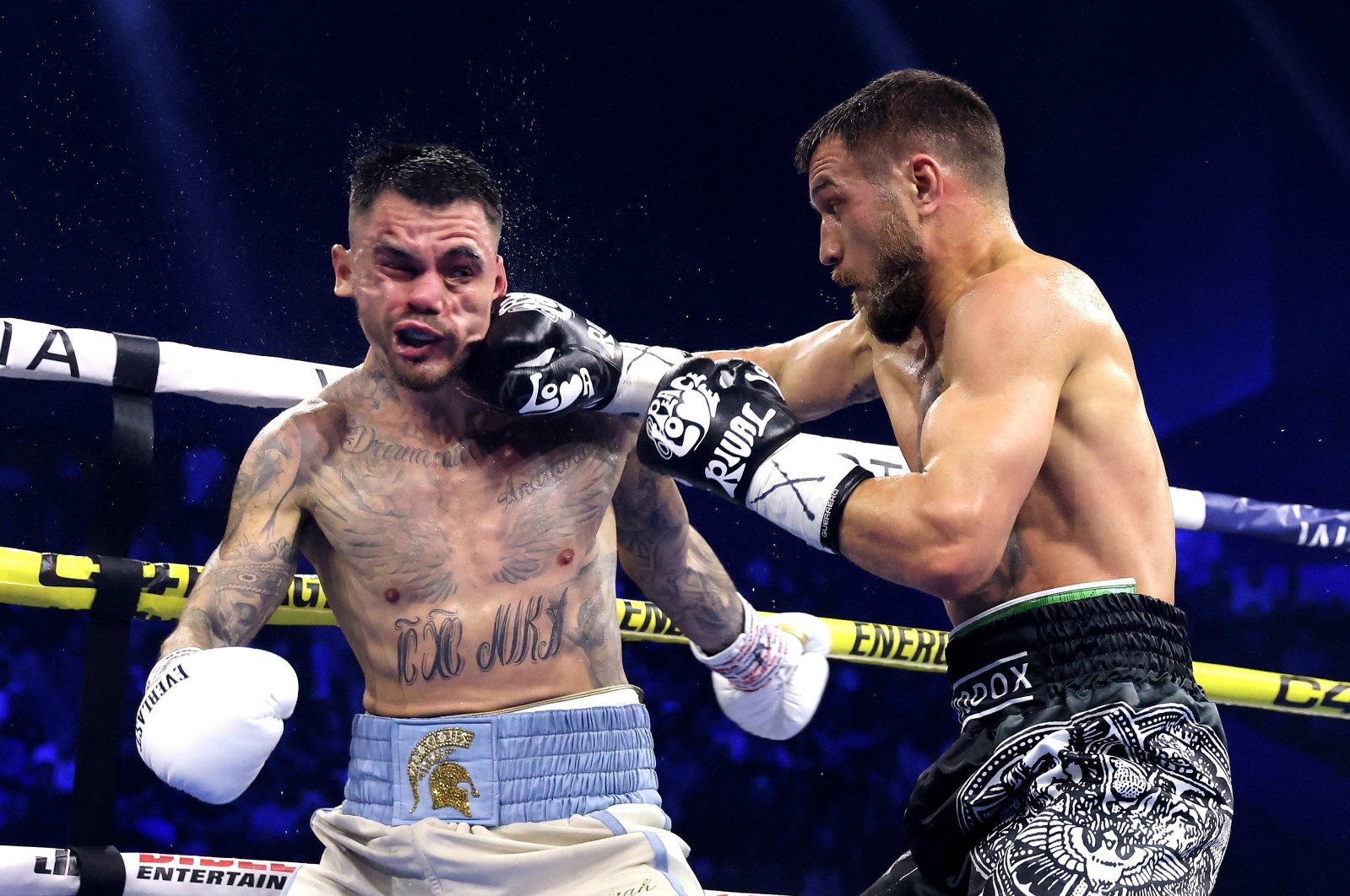 Vasiliy Lomachenko (R) in action with George Kambosos Jr. during their IBF lightweight championship fight, Perth, Australia, May 12, 2024.