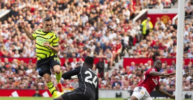 Arsenal&#039;s Leandro Trossard (L) scores the 0-1 goal against goalkeeper Manchester United&#039;s Andre Onana (C) during the English Premier League match, Manchester, U.K., May 12, 2024. (EPA Photo)