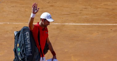 Serbia's Novak Djokovic salutes the audience after losing against Alejandro Tabilo of Chile (not pictured) during their men's singles match at the Italian Open, Rome, Italy, May 12, 2024. (EPA Photo)