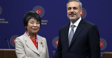 Foreign Minister Hakan Fidan (R) and Japanese Foreign Minister Yoko Kamikawa (L) shake hands during a news conference after their meeting in Ankara, Turkey, Jan. 16, 2024. (EPA Photo)
