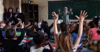 Displaced Palestinian children attend a class in Beit Lahiya in the northern Gaza Strip, Palestine, May 4, 2024. (AFP Photo)