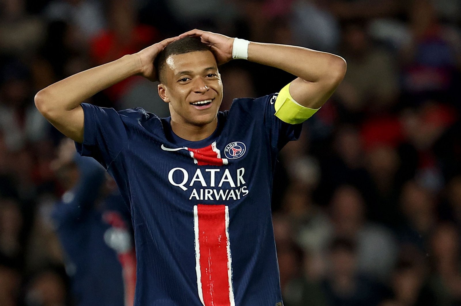 Paris Saint-Germain&#039;s Kylian Mbappe reacts after missing a goal opportunity during the French L1 football match against Toulouse (TFC), Parc des Princes stadium, Paris, France, May 12, 2024. (AFP Photo)