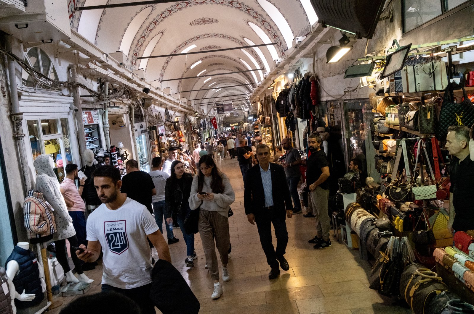 People are photographed at a bazaar in Istanbul, Türkiye, Oct. 11, 2022. (Reuters Photo)