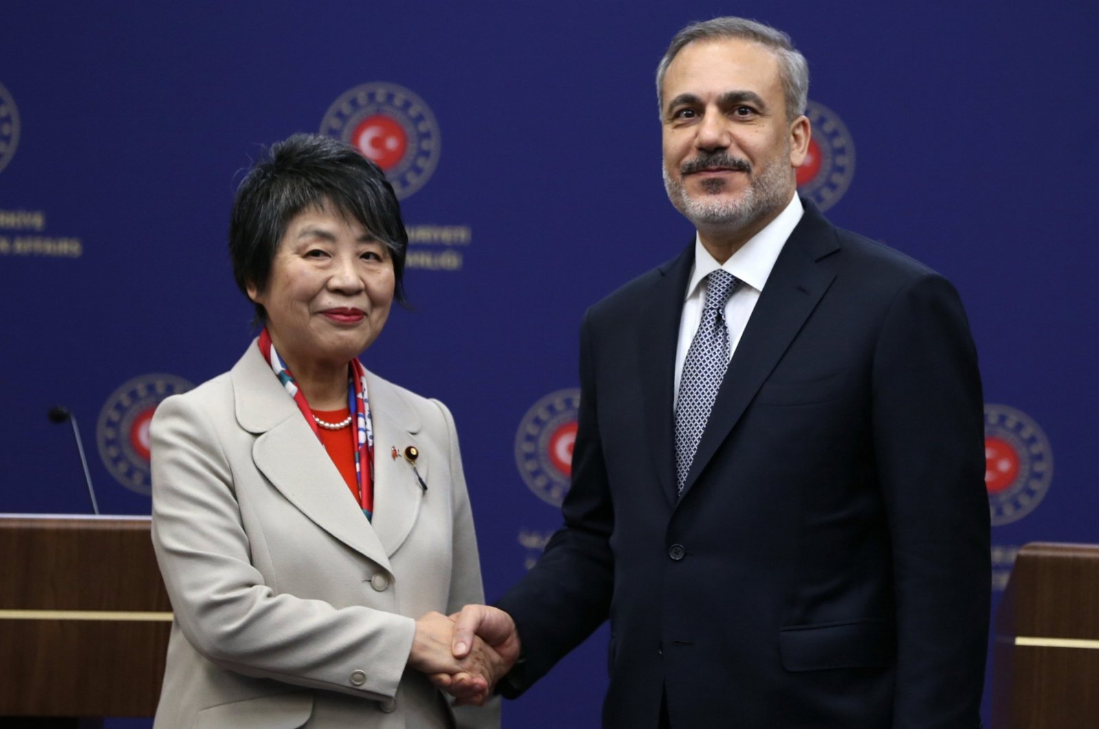 Foreign Minister Hakan Fidan (R) and Japanese Foreign Minister Yoko Kamikawa (L) shake hands during a news conference after their meeting in Ankara, Turkey, Jan. 16, 2024. (EPA Photo)