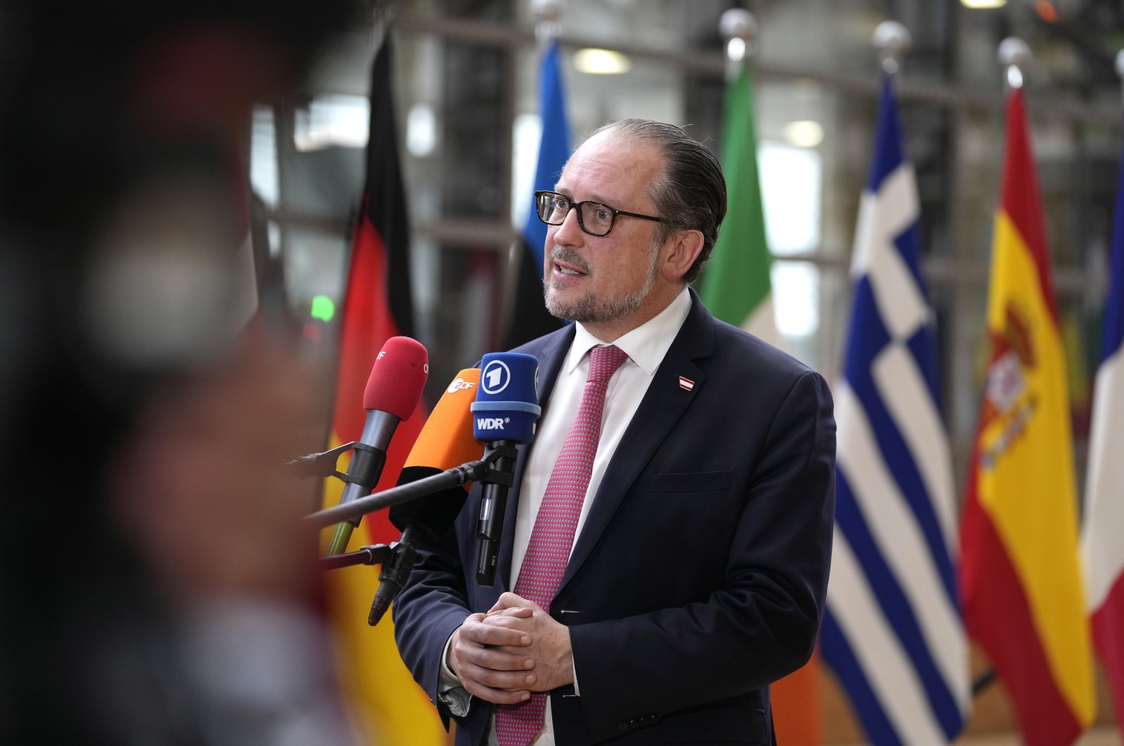 Austrian Foreign Minister Alexander Schallenberg speaks with the media, Brussels, Belgium, May 22, 2023. (AP Photo)