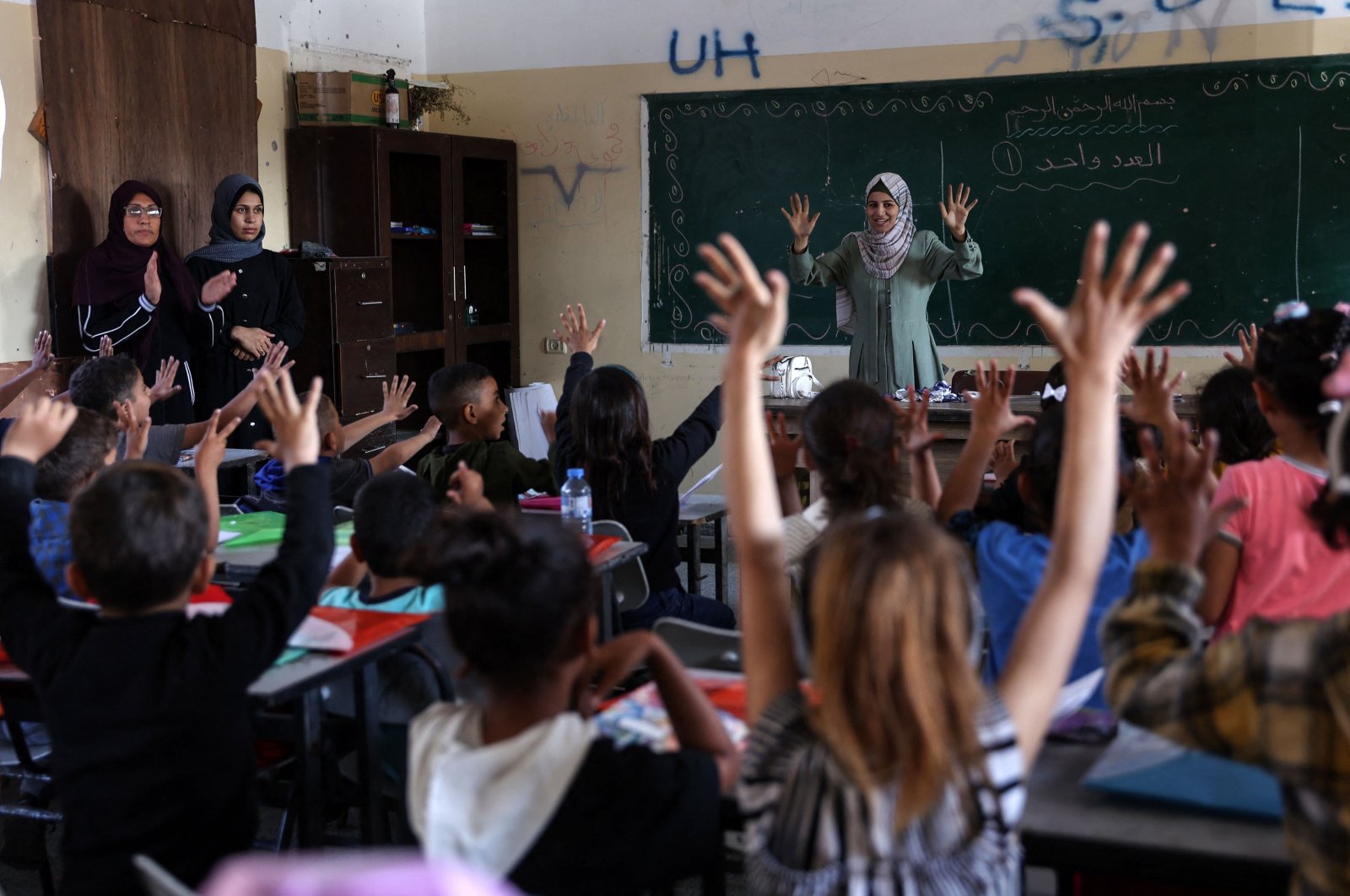 Displaced Palestinian children attend a class in Beit Lahiya in the northern Gaza Strip, Palestine, May 4, 2024. (AFP Photo)