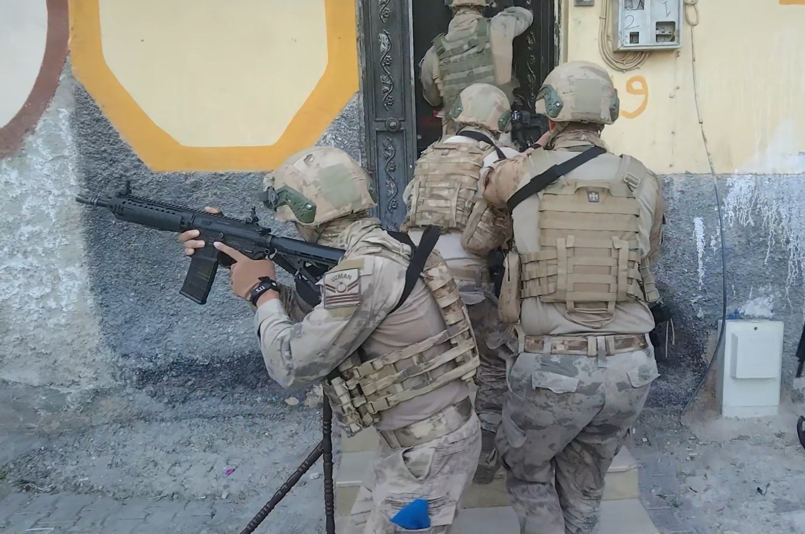 Security forces raid a residence in Şanlıurfa, southeastern Türkiye, May 14, 2024. (DHA Photo)