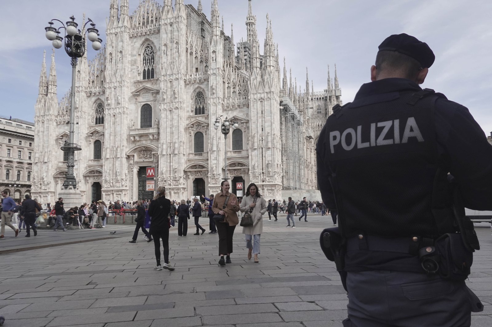 Police patrol in front of Milan gothic cathedral in Milan, March 25, 2024. (AP Photo)