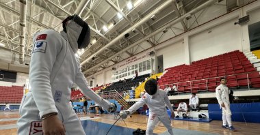 Turkish fencers Mert Ahmet Koç (L) and Alaz Güney Karakaş train for the Turkish School Sports Fencing Championships, Karaman, Türkiye, May 15, 2024. (AA Photo)