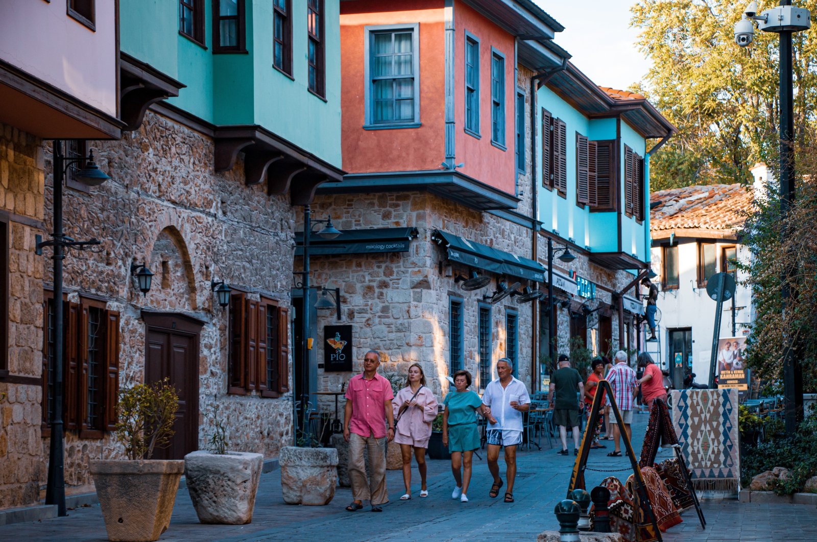 A group of tourists walks in the historic Kaleiçi area of Antalya, southern Türkiye, May 14, 2024. (IHA Photo)