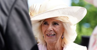 Britain's Queen Consort Camilla speaks with guests during the Sovereign's Creative Industries Garden Party at Buckingham Palace, London, Britain, May 15, 2024. (AFP Photo)
