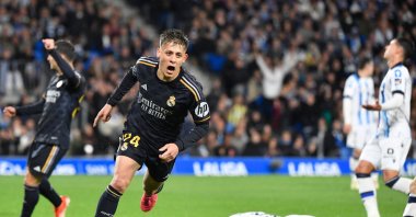 Real Madrid's Arda Güler celebrates scoring his team's first goal during the Spanish league football match against Real Sociedad, at the Anoeta stadium, San Sebastian, Spain, April 26, 2024. (AFP Photo)