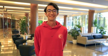 Turkish archer Mete Gazoz poses for a photo after an interview in a training camp, Antalya, Türkiye, May 14, 2024. (AA Photo)