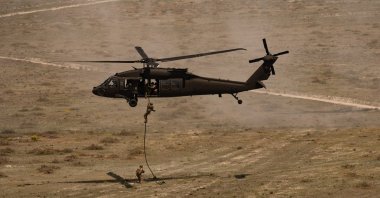 Turkish troops rappel from a helicopter during the exercise, Konya, central Türkiye, May 16, 2024. (AA Photo)