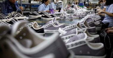 Employees work at a shoe factory for export in Hanoi, Vietnam, Dec. 29, 2020.