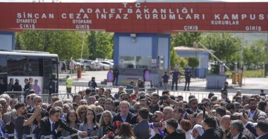Peoples' Equality and Democracy Party (DEM Party) officials speak to reporters outside the prison-courthouse complex where the trial was held, Ankara, Türkiye, May 16, 2024. (AA Photo)