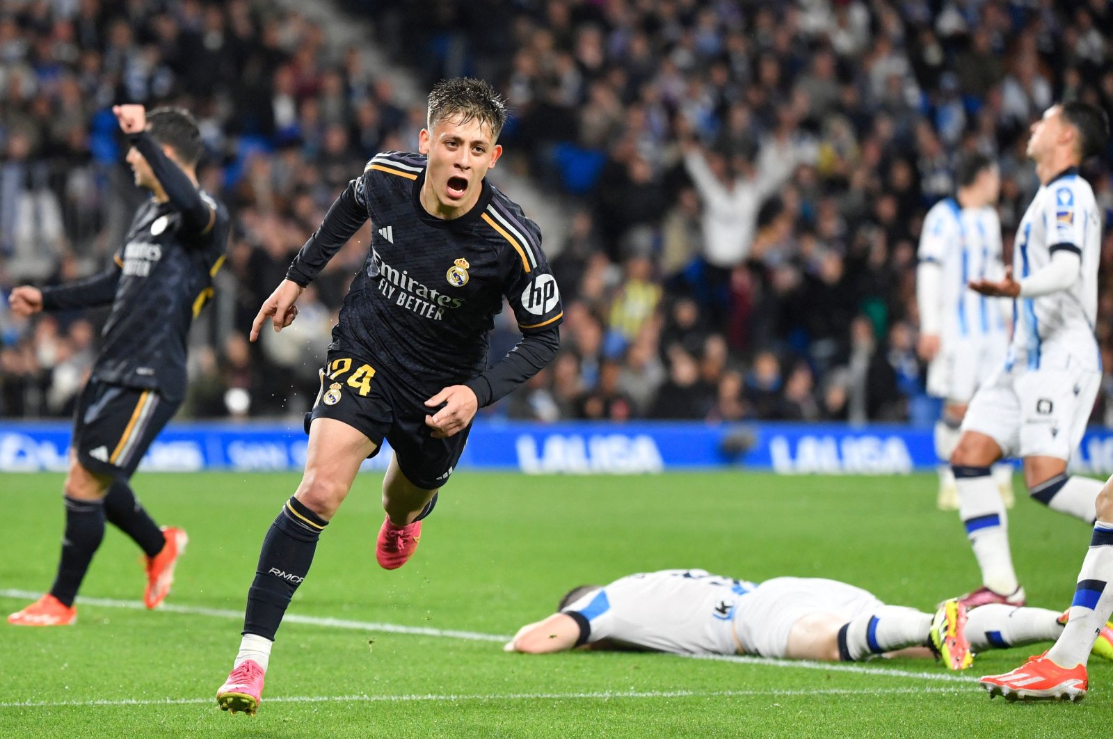 Real Madrid&#039;s Arda Güler celebrates scoring his team&#039;s first goal during the Spanish league football match against Real Sociedad, at the Anoeta stadium, San Sebastian, Spain, April 26, 2024. (AFP Photo)