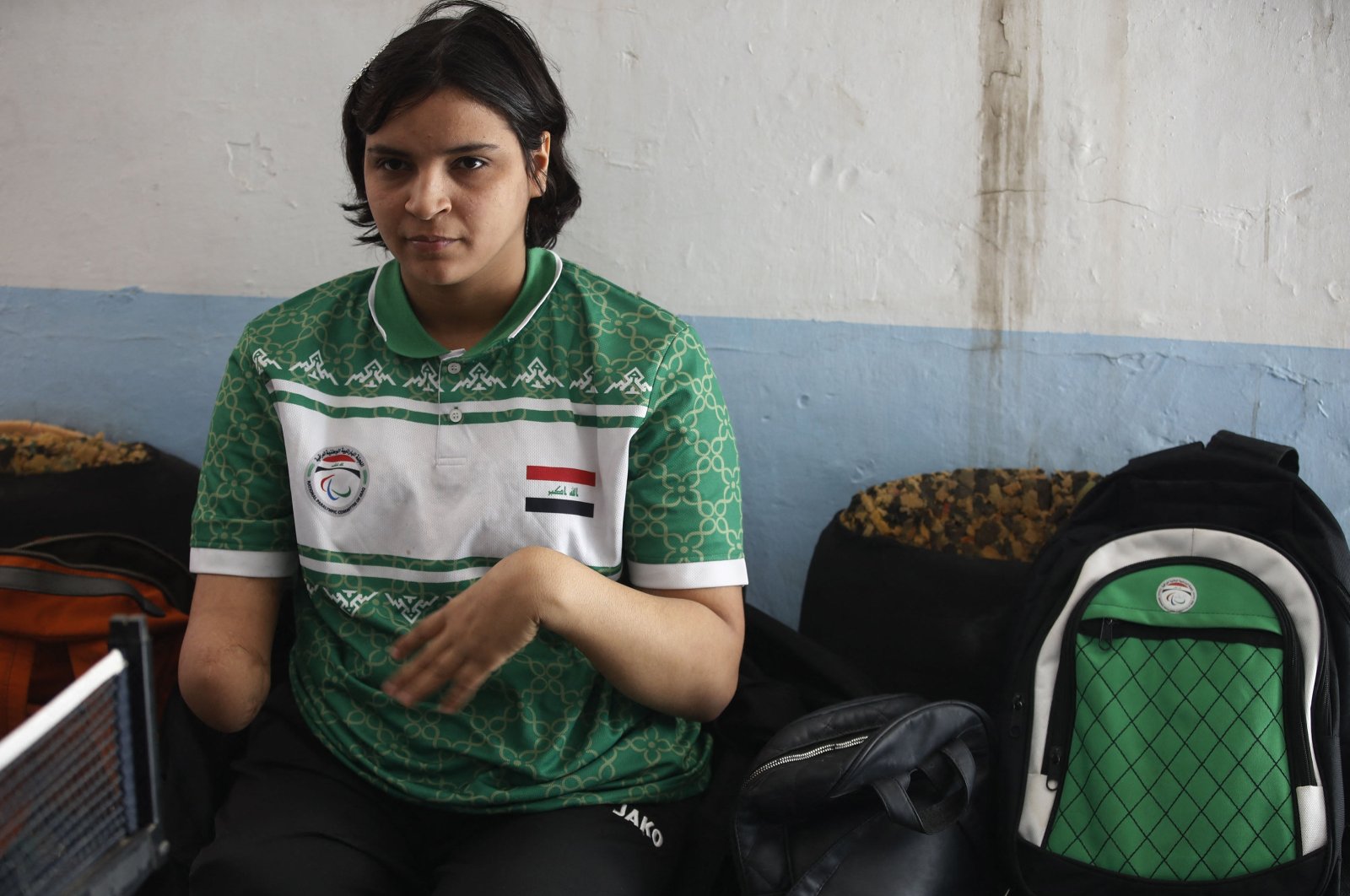 Iraqi paralympics table tennis athlete Najla Imad, exercises at the Al-Mawaheb Club premises, Baqubah, Iraq, Feb. 26, 2024. (AFP Photo)