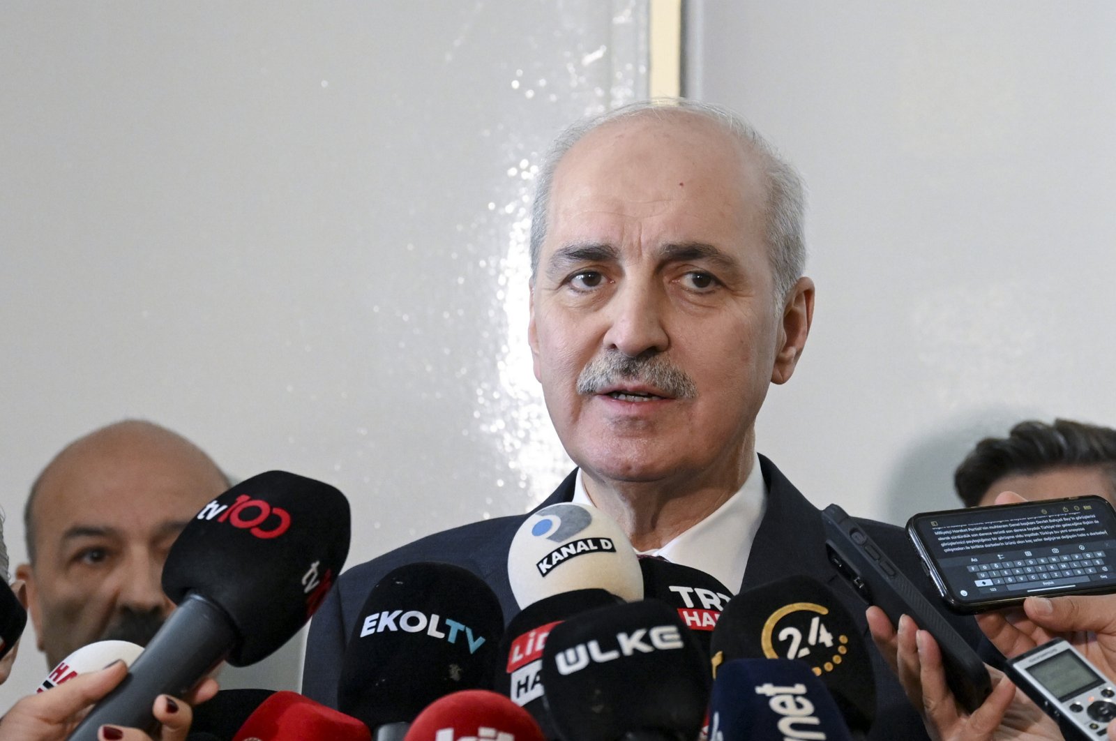 Parliament Speaker Numan Kurtulmuş talks to reporters after meeting the Nationalist Movement Party (MHP) group at Parliament, Ankara, Türkiye, May 14, 2024. (AA Photo)