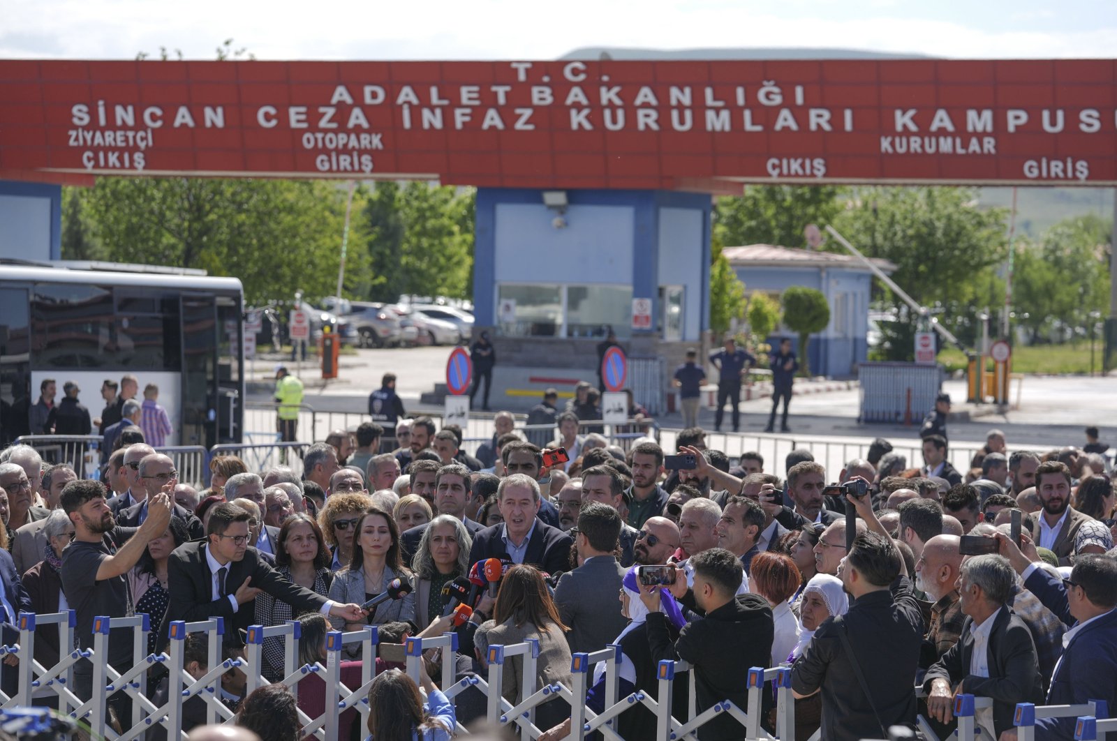 Peoples&#039; Equality and Democracy Party (DEM Party) officials speak to reporters outside the prison-courthouse complex where the trial was held, Ankara, Türkiye, May 16, 2024. (AA Photo)