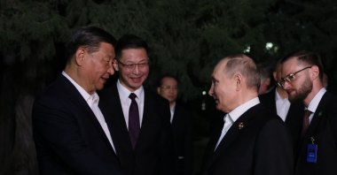 China's President Xi Jinping (L) and Russia's President Vladimir Putin shake hands after their talks, Beijing, China, May 16, 2024. (AFP Photo)